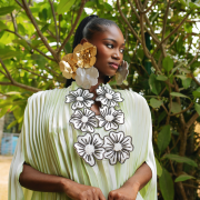 Pleated organza dress adorned with hand-beaded stone flower embellishments
