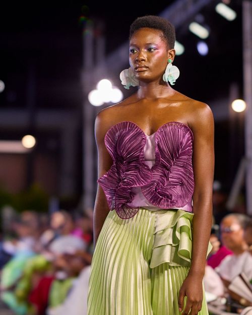 THE DISCUS BUSTIER & THE PLEATED LOGO PANT WITH SIDE FRILLS